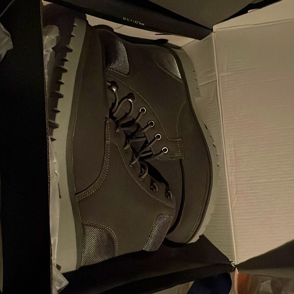 Brand new combat boots.size 10 and they are grey.